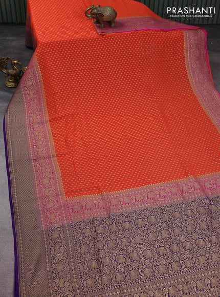 Banarasi georgette saree orange and violet with allover thread & zari woven butta weaves and long woven border