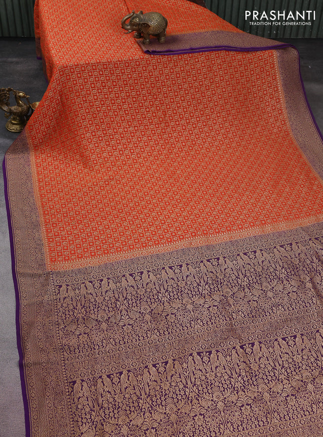Banarasi georgette saree orange and violet with allover checked pattern & woven buttas and woven border