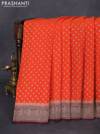 Banarasi georgette saree orange and coffee brown with allover thread & zari woven butta weaves and woven border