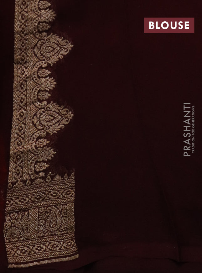 Banarasi georgette saree orange and coffee brown with allover thread & zari woven butta weaves and woven border