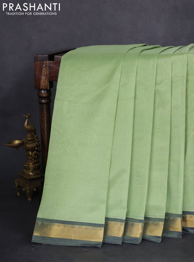 10 yards silk cotton saree pista green and navy blue with plain body and zari woven border