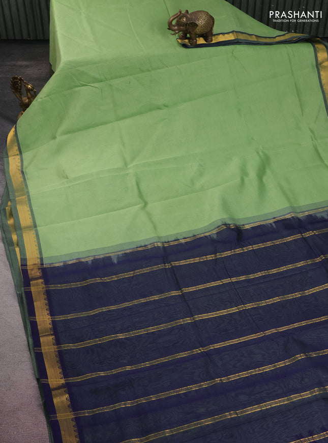 10 yards silk cotton saree pista green and navy blue with plain body and zari woven border