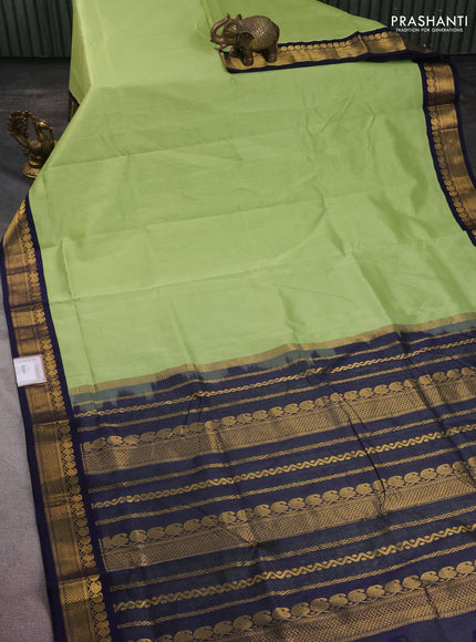 10 yards silk cotton saree pista green and navy blue with plain body and zari woven border