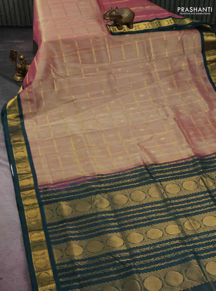 10 yards silk cotton saree dual shade of pista green and peacock green with allover zari checks & buttas and zari woven border