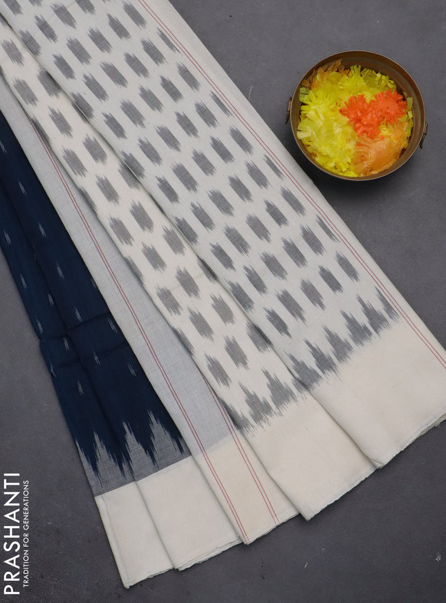 Ikat cotton saree peacock blue and off white with allover ikat butta weaves and temple deision simple border