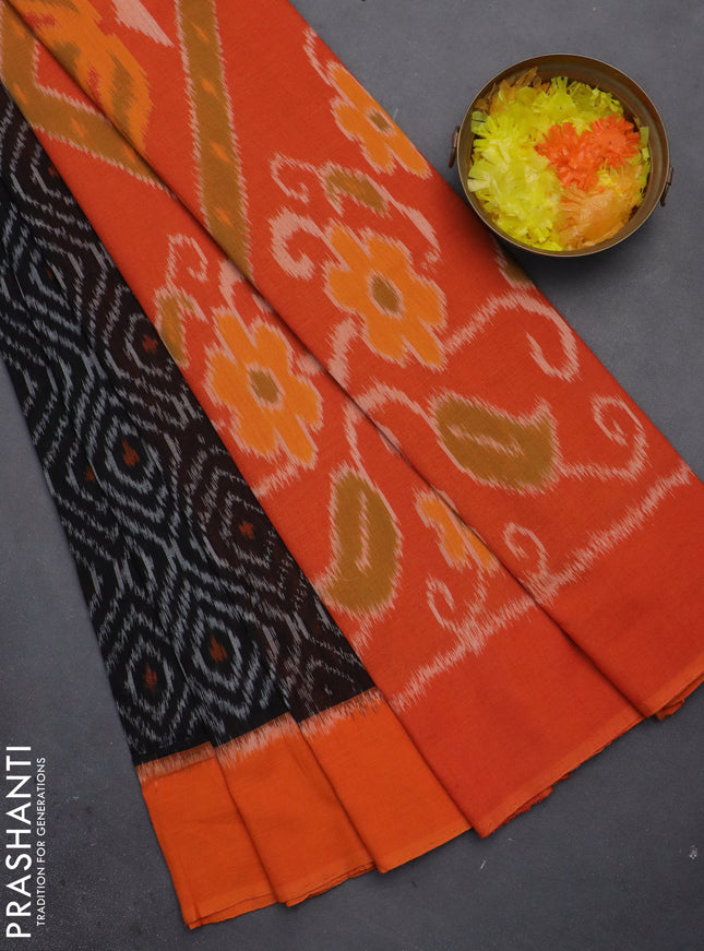 Ikat cotton saree black and orange with allover ikat weaves and simple border