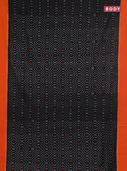 Ikat cotton saree black and orange with allover ikat weaves and simple border