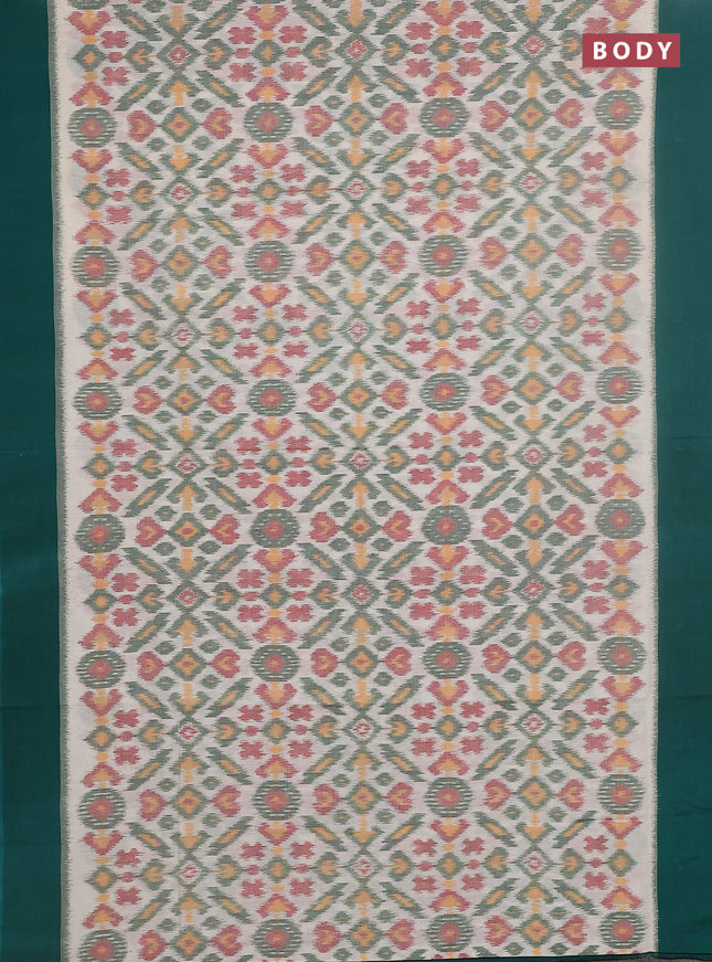 Ikat cotton saree cream and teal green with allover ikat weaves and simple border