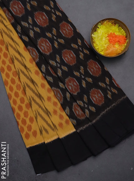 Ikat cotton saree yellow and black with allover ikat weaves and simple border