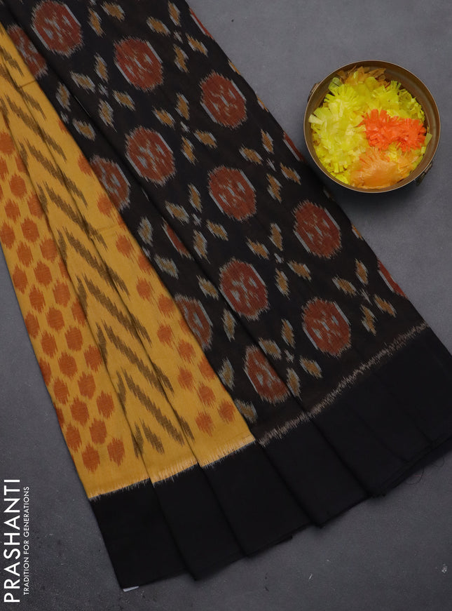Ikat cotton saree yellow and black with allover ikat weaves and simple border