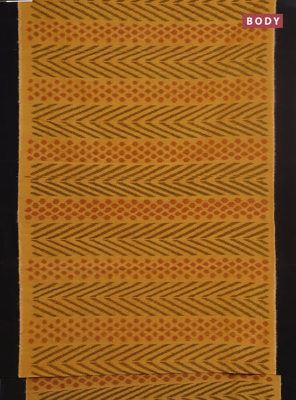 Ikat cotton saree yellow and black with allover ikat weaves and simple border