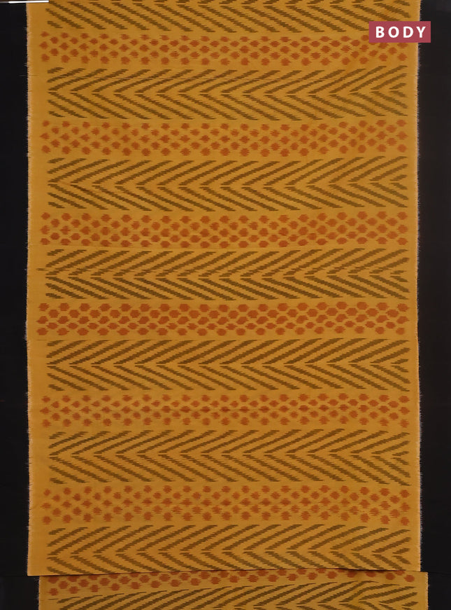 Ikat cotton saree yellow and black with allover ikat weaves and simple border
