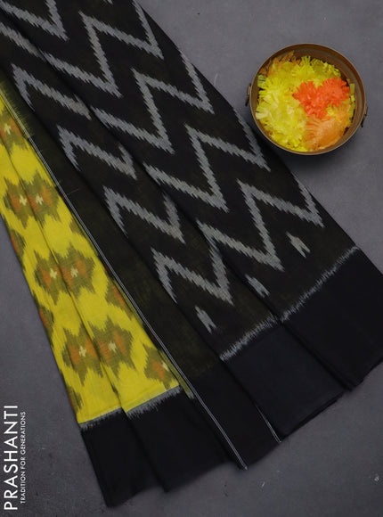 Ikat cotton saree yellow and black with allover ikat butta weaves and simple border