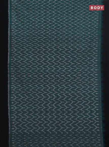 Ikat cotton saree teal green and black with allover ikat weaves and simple border