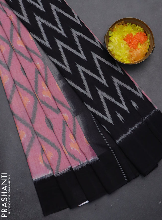 Ikat cotton saree pink shade and black with allover ikat butta weaves and simple border