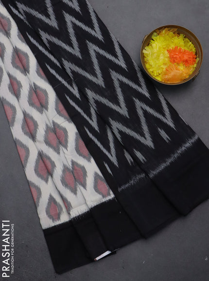 Ikat cotton saree off white and black with allover ikat butta weaves and simple border