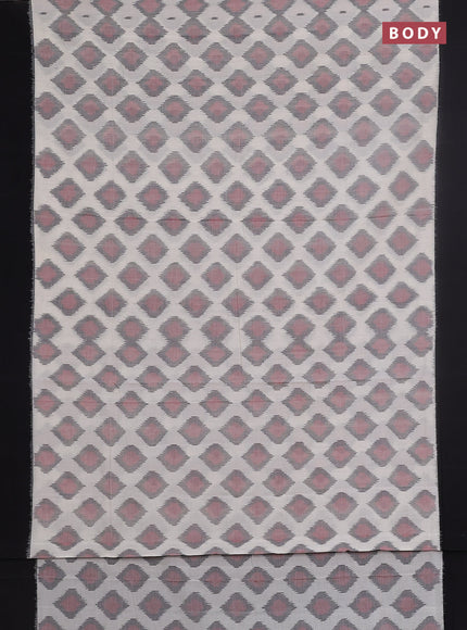 Ikat cotton saree off white and black with allover ikat butta weaves and simple border