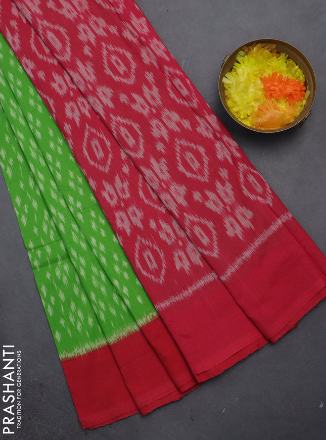 Ikat cotton saree light green and pink with allover ikat butta weaves and long ikat style border