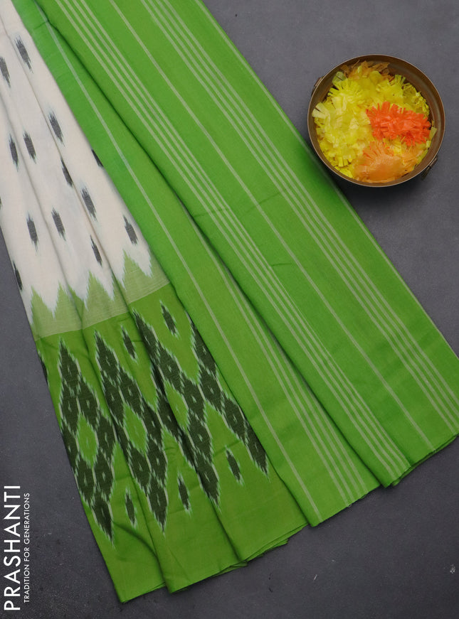 Ikat cotton saree off white and light green with allover ikat butta weaves and long ikat style border
