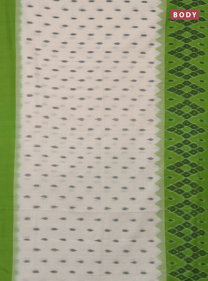 Ikat cotton saree off white and light green with allover ikat butta weaves and long ikat style border