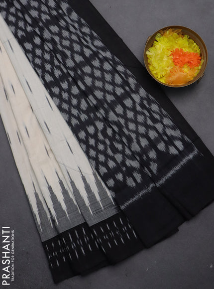 Ikat cotton saree off white and black with allover ikat butta weaves and temple design simple border