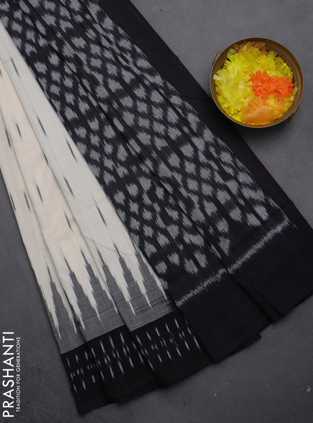 Ikat cotton saree off white and black with allover ikat butta weaves and temple design simple border