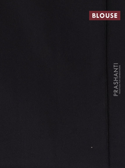 Ikat cotton saree off white and black with allover ikat butta weaves and temple design simple border