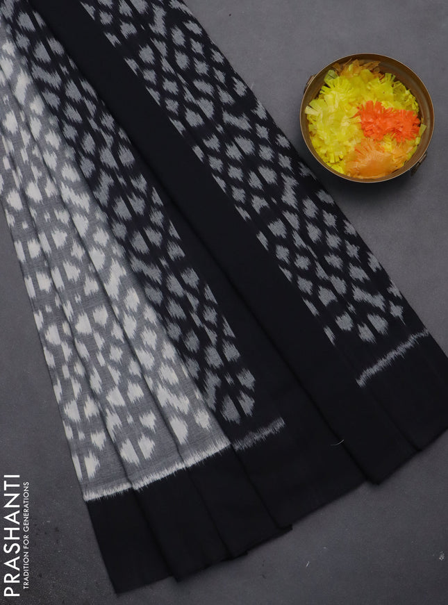 Ikat cotton saree grey and black with allover ikat weaves and simple border