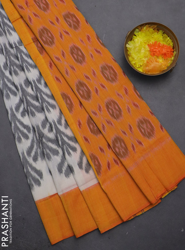 Ikat cotton saree off white and mango yellow with allover ikat weaves and simple border