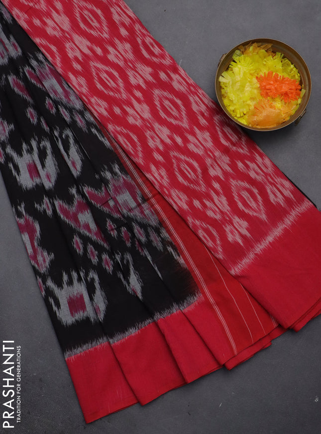 Ikat cotton saree black and pink with allover ikat weaves and simple border