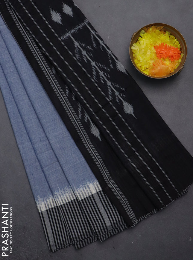Ikat cotton saree bluish grey and black with plain body and simple border