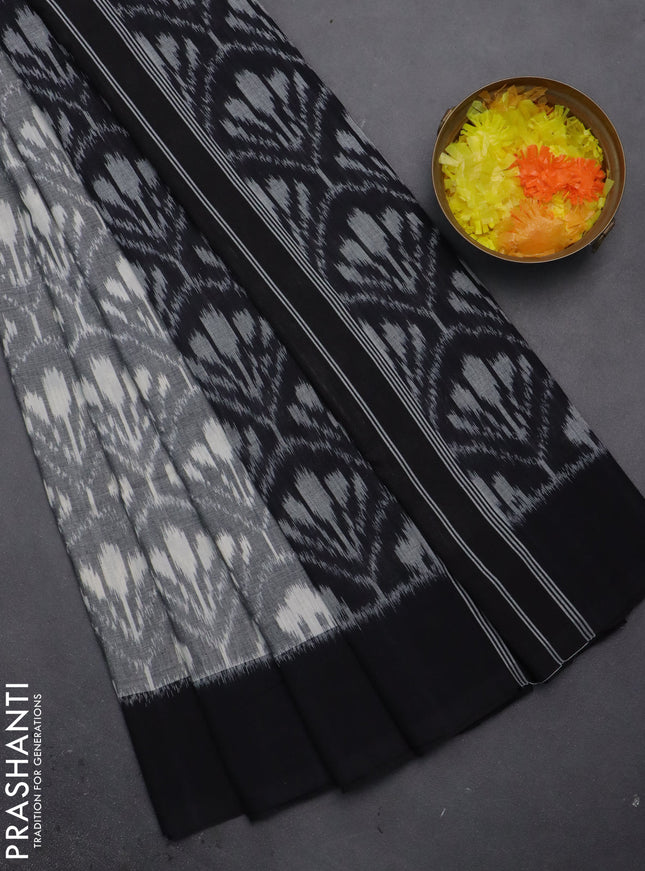 Ikat cotton saree grey and black with allover ikat weaves and simple border