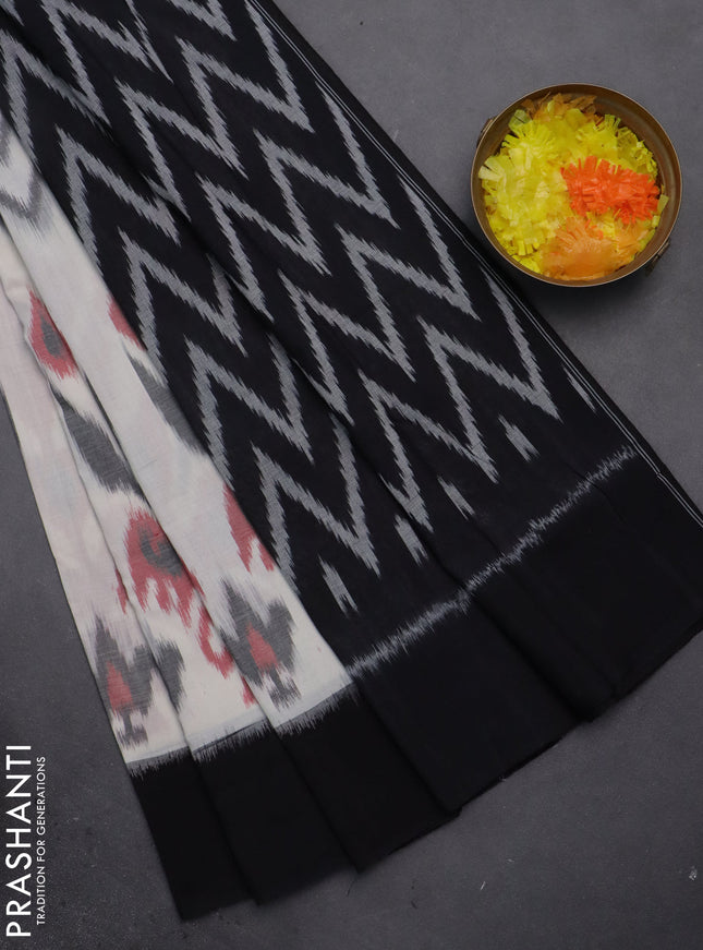 Ikat cotton saree off white and black with allover zig zag ikat weaves and long ikat style border
