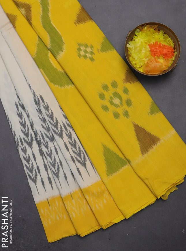 Ikat cotton saree cream and yellow with plain body and ikat style border