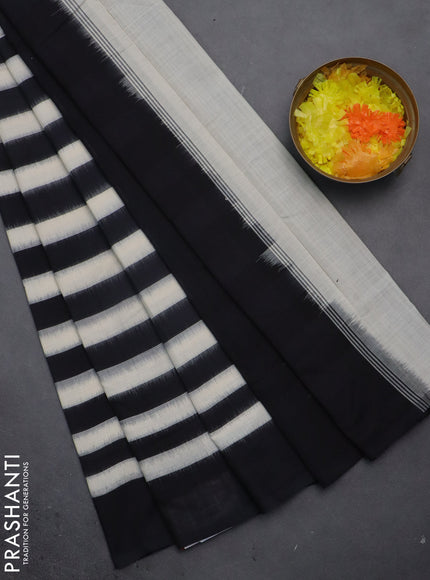 Ikat cotton saree off white. and black with stripes pattern and simple border