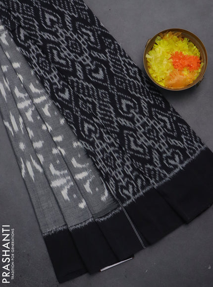 Ikat cotton saree grey and black with allover ikat weaves and simple border