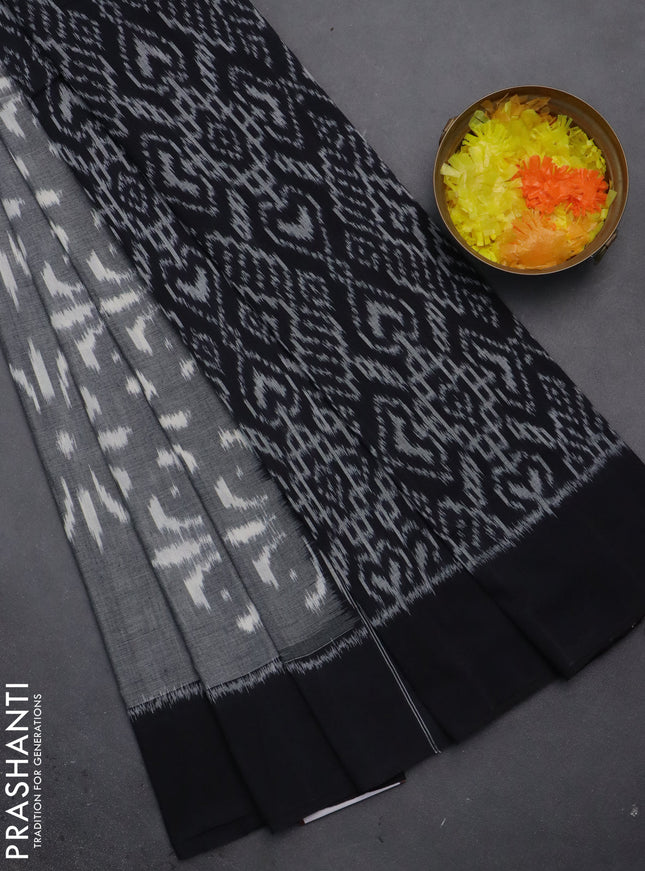 Ikat cotton saree grey and black with allover ikat weaves and simple border