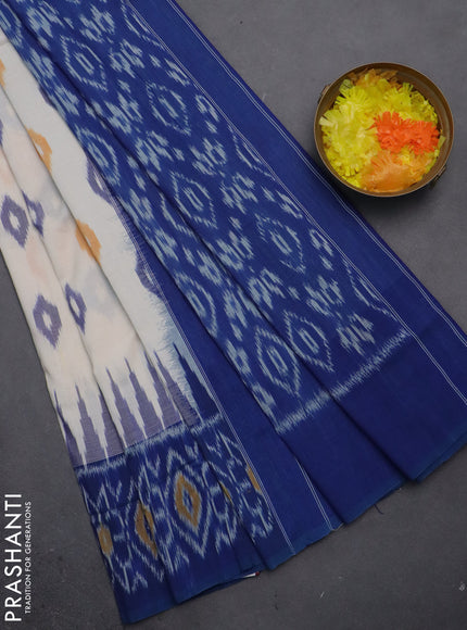 Ikat cotton saree off white and blue with allover ikat butta weaves and temple design ikat style border