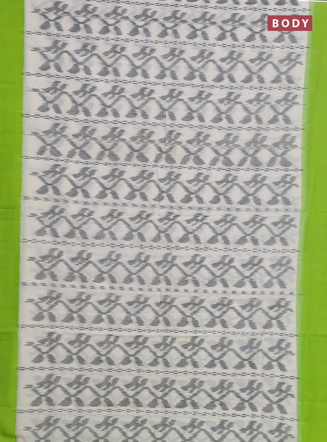 Ikat cotton saree off white and light green with allover ikat weaves and simple border