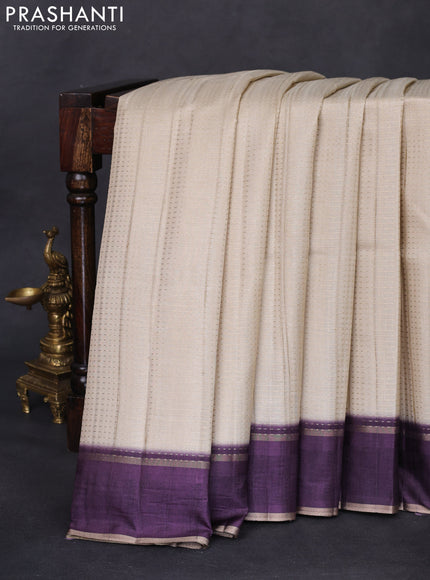 Semi matka saree cream and deep jamun with allover zari weaves and rettapet zari woven border