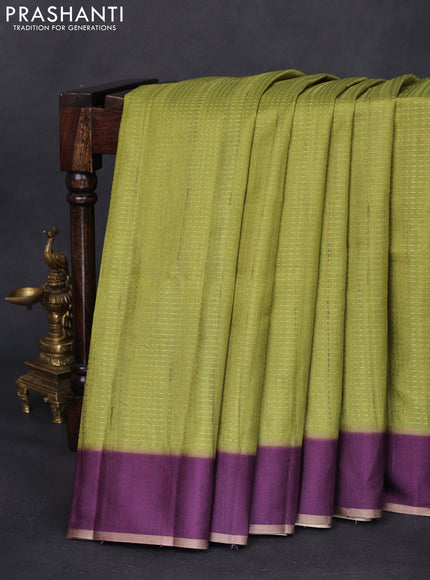 Semi matka saree lime green and deep purple with allover zari weaves and rettapet zari woven border