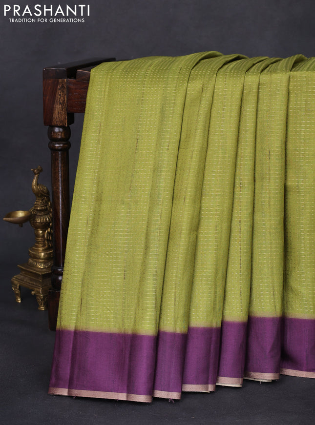 Semi matka saree lime green and deep purple with allover zari weaves and rettapet zari woven border