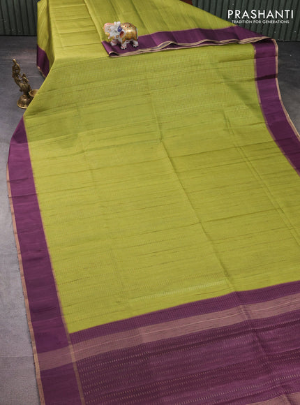 Semi matka saree lime green and deep purple with allover zari weaves and rettapet zari woven border