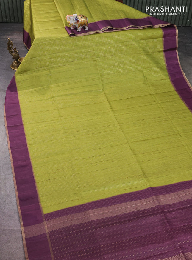 Semi matka saree lime green and deep purple with allover zari weaves and rettapet zari woven border