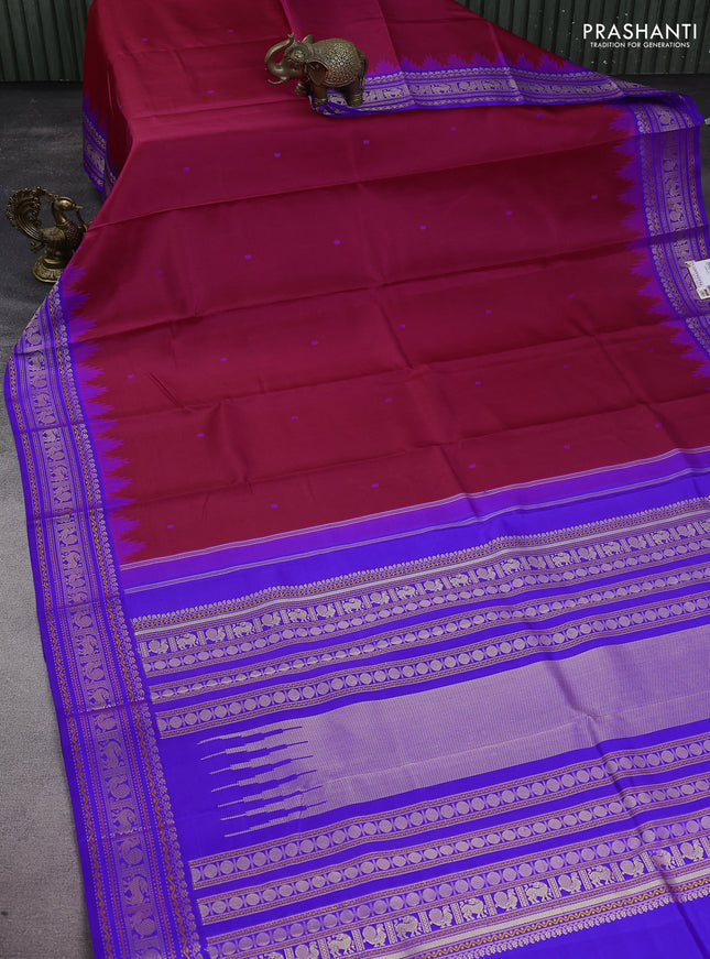 Pure kanchipuram silk saree pink and royal blue with thread woven buttas and temple design thread woven border