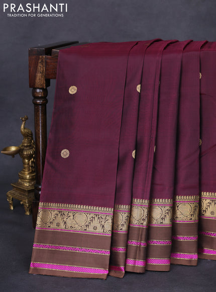 Pure kanchipuram silk saree wine shade and brown with zari woven buttas and annam & temple design zari border