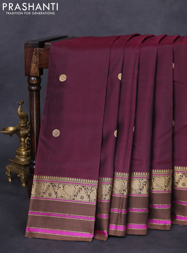 Pure kanchipuram silk saree wine shade and brown with zari woven buttas and annam & temple design zari border