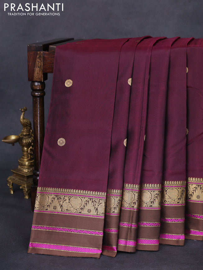 Pure kanchipuram silk saree wine shade and brown with zari woven buttas and annam & temple design zari border