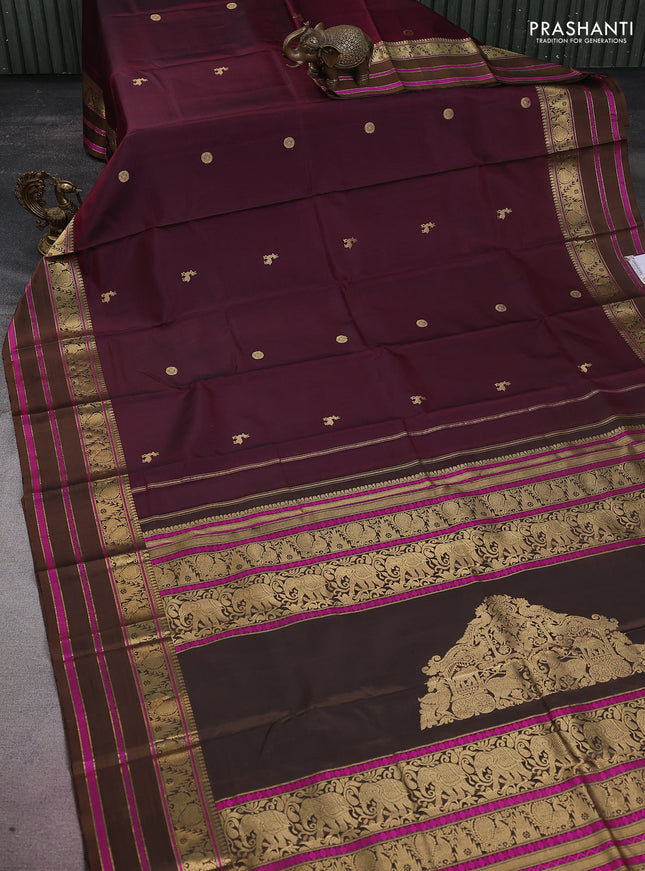 Pure kanchipuram silk saree wine shade and brown with zari woven buttas and annam & temple design zari border