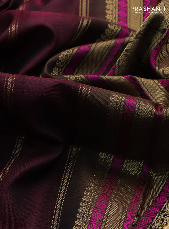 Pure kanchipuram silk saree wine shade and brown with zari woven buttas and annam & temple design zari border